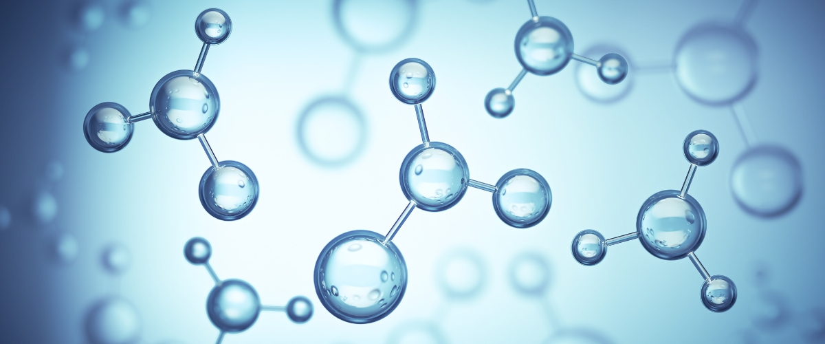 A slide shows the joining of chemical compounds.